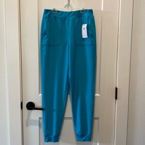 Nike Women’s‎ Bright Spruce Tek Gear Pants.